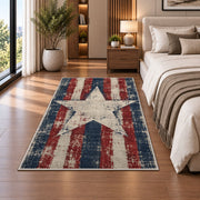 Distressed Americana Star rug in a bedroom beside the bed