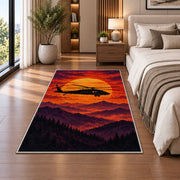 Helicopter Sunset rug in a bedroom beside the bed