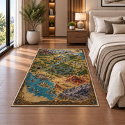Fantasy coastal world map rug with harbor, desert, mountain ranges, and compass in a bedroom beside a bed