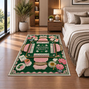Green Mahjong Table Rug with Pink Floral Tea Details in a bedroom beside a bed