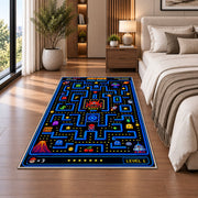 Arcade maze quest level one rug in a bedroom beside the bed
