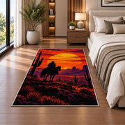 Cowboy sunset rider rug in a bedroom beside the bed