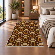 Hats and horseshoes rug in a bedroom beside the bed