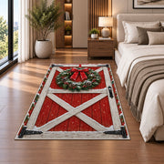 Red Barn Door Christmas Wreath rug in a bedroom beside the bed