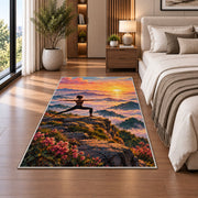 warrior pose mountain rug in a bedroom beside the bed