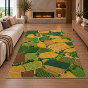 Patchwork Farm Fields Aerial rug in a living room with a fireplace