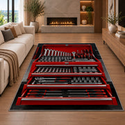 Red toolbox with open drawers rug in a living room with a fireplace