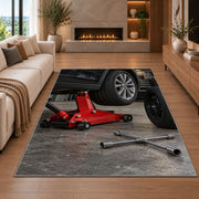 Car jack and spare tire rug in a living room with a fireplace
