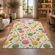 Knitting Tools Pattern Rug in a living room with a desk and large windows