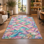 Mermaid Scales and Shells Pattern Rug in a living room with a desk and large windows