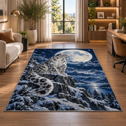 Snow Leopard Under Full Moon Rug in a living room with a desk and large windows