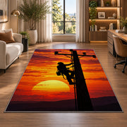 lineman climbing pole silhouette rug in a living room with a desk and large windows