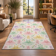 Pastel tutu pattern rug in a living room with a desk and large windows