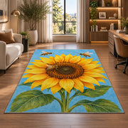 Sunflower and Bees Rug in a living room with a desk and large windows