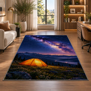 Orange Tent Under the Milky Way rug in a living room with a desk and large windows