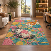 Kittens Tangled in Yarn rug in a living room with a desk and large windows