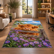 Highland Cow Fence Rug in a living room with a desk and large windows