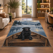 Black Lab in Rowboat rug in a living room with a desk and large windows