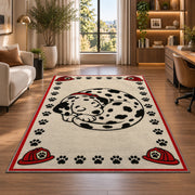 Sleeping Dalmatian rug in a living room with a desk and large windows