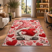 pink gnome hugging a heart rug in a living room with a desk and large windows