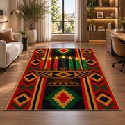 Kwanzaa Kinara Rug in a living room with a desk and large windows