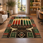 Mudcloth Kwanzaa Rug in a living room with a desk and large windows