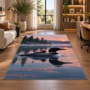 Loon and chick at sunrise rug in a living room with a desk and large windows