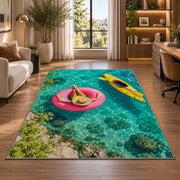 Pink float and yellow kayak rug in a living room with a desk and large windows