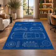 Classic car blueprint rug in a living room with a desk and large windows