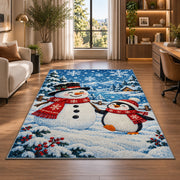 Snowman and Penguin Rug in a living room with a desk and large windows
