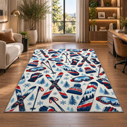 Ski gear pattern rug in a living room with a desk and large windows