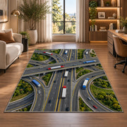Highway interchange from above rug in a living room with a desk and large windows