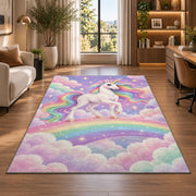 white unicorn on a rainbow rug in a living room with a desk and large windows
