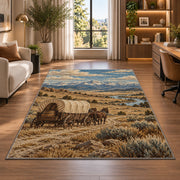 Covered wagon prairie rug in a living room with a desk and large windows