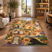 cats doing yoga rug in a living room with a desk and large windows