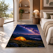 Orange Tent Under the Milky Way rug in a bedroom with an arched window