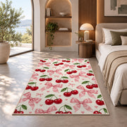 Cherry and Bow Pattern Rug in a bedroom with an arched window