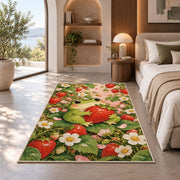frog hugging a strawberry rug in a bedroom with an arched window