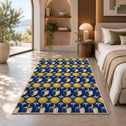Gold Coin and Dreidel Rug in a bedroom with an arched window