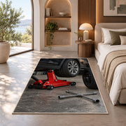 Car jack and spare tire rug in a bedroom with an arched window