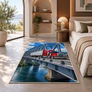 Semi truck crossing a steel bridge rug in a bedroom with an arched window