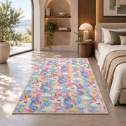 unicorn heads and stars pattern on pastel stripes rug in a bedroom with an arched window