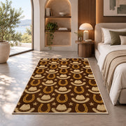 Hats and horseshoes rug in a bedroom with an arched window