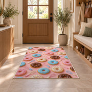 Donut pattern rug in an entryway with a wooden door and bench