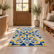 Geometric whisks and measuring cups rug in an entryway with a wooden door and bench