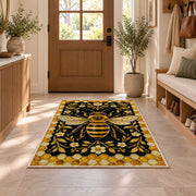 Golden Bee Honeycomb Border Rug in an entryway with a wooden door and bench