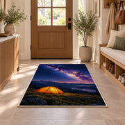 Orange Tent Under the Milky Way rug in an entryway with a wooden door and bench