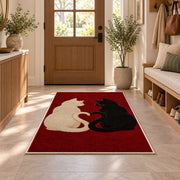 Cats with Heart Tails rug in an entryway with a wooden door and bench