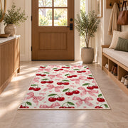 Cherry and Bow Pattern Rug in an entryway with a wooden door and bench