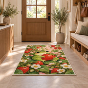 frog hugging a strawberry rug in an entryway with a wooden door and bench